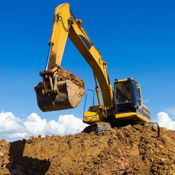 large-yellow-excavator-moving-dirt
